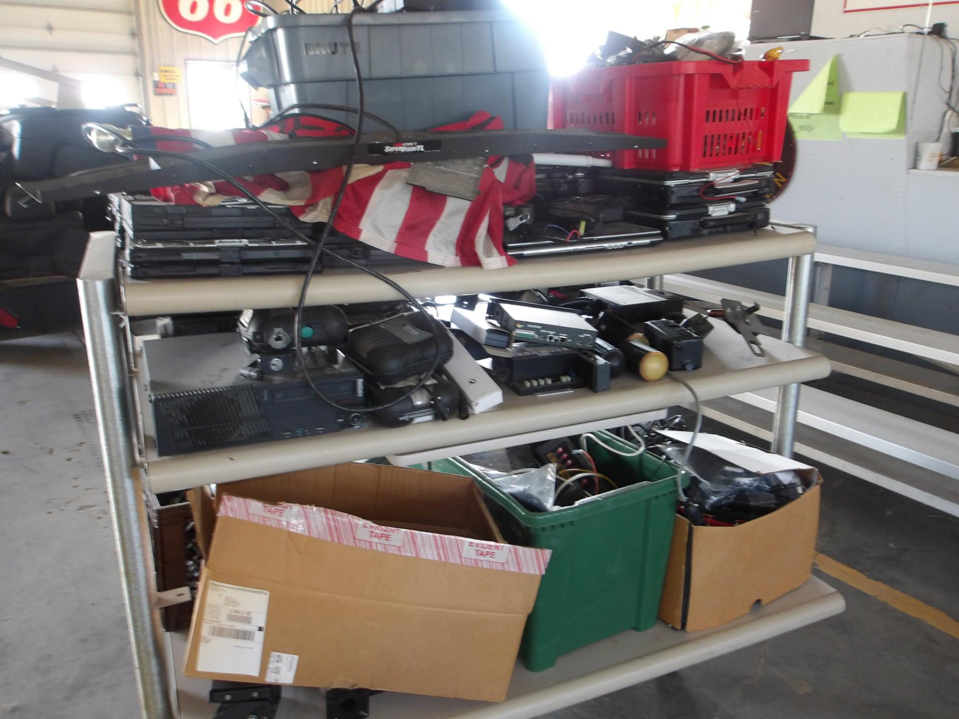 Abandoned property, Interior parts for police cars and retired electronic equipment from police vehicles.