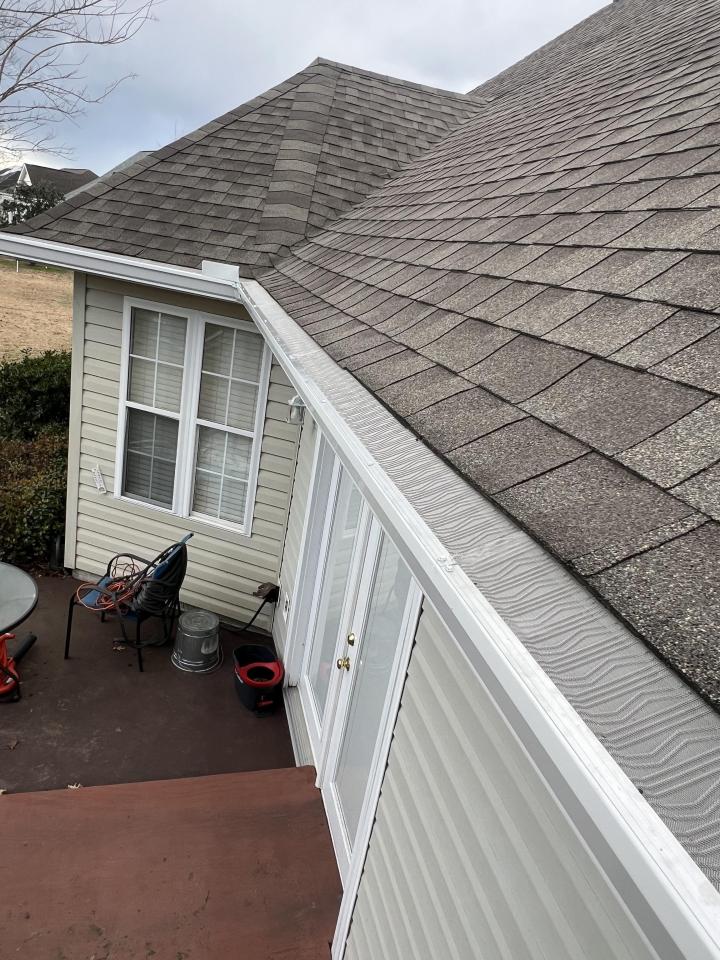 Say Goodbye to Clogged Gutters with Our Cleaning Service