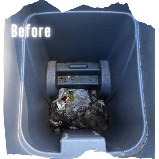 A residential trash bin showing built-up grime and residue before cleaning