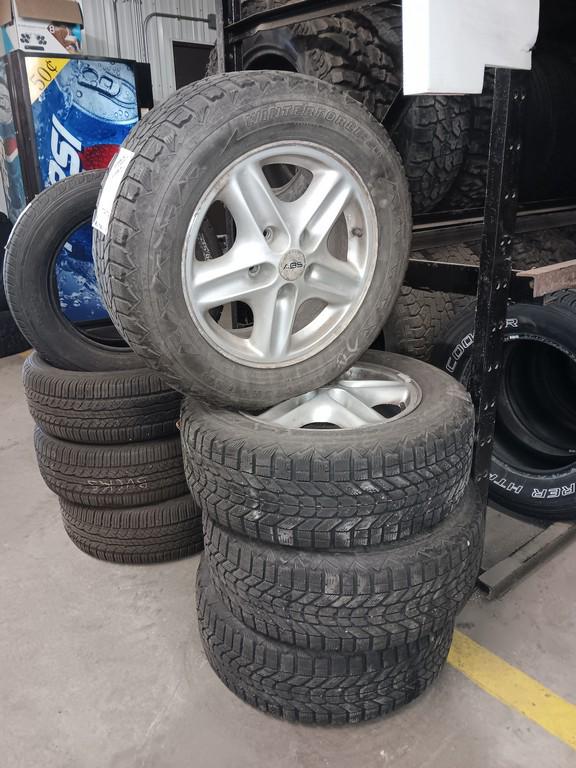 225/60R16 Firestone Winterforce Tires on 5 Bolt Jeep Rims