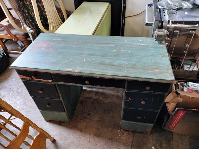 Antique green desk with pencil sharpener
