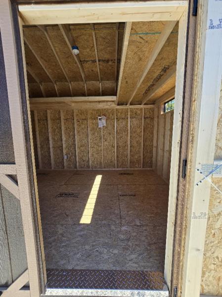 10% OFF - SAVE $1,043 on this 10x24 BARN W/DIVIDER WALL/100 AMP ELECT./WORKBENCH & MORE - $9,396 OR $371 DOWN & $371/MO - EVERYONE APPROVED - FREE DELIVERY & BLOCKS up to 50 Miles