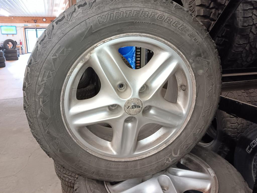 225/60R16 Firestone Winterforce Tires on 5 Bolt Jeep Rims