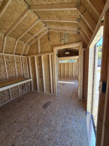 10% OFF - SAVE $1,043 on this 10x24 BARN W/DIVIDER WALL/100 AMP ELECT./WORKBENCH & MORE - $9,396 OR $371 DOWN & $371/MO - EVERYONE APPROVED - FREE DELIVERY & BLOCKS up to 50 Miles