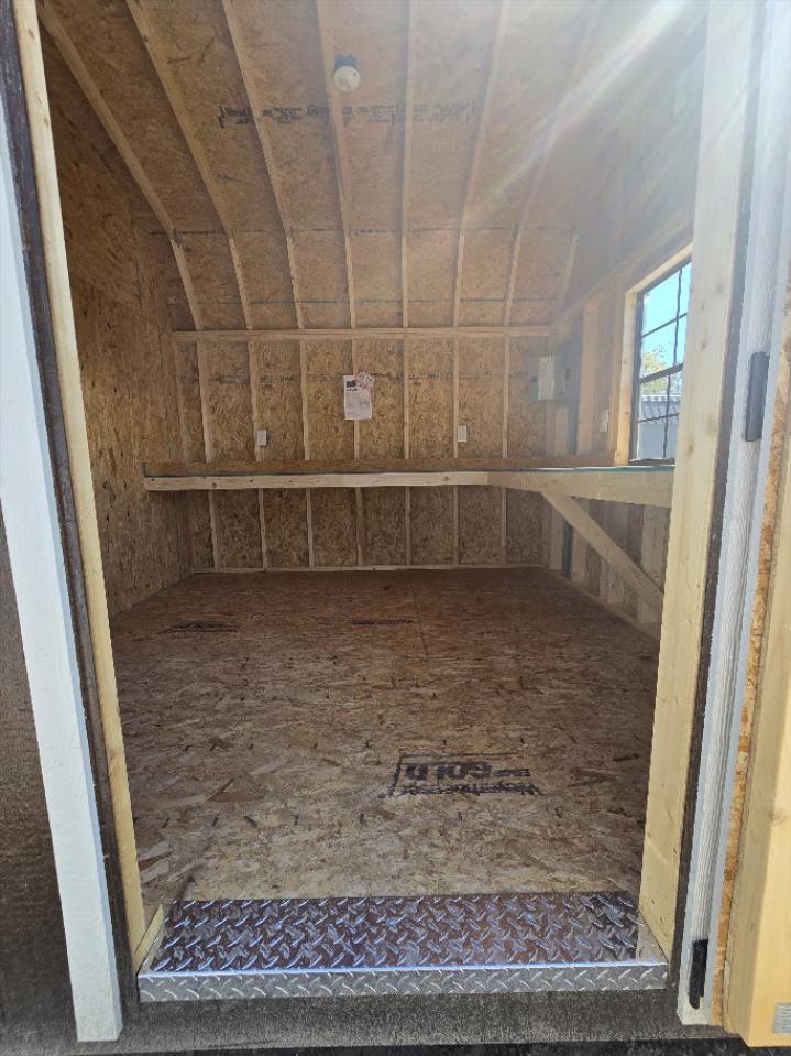 $1,013 off! -10x24 BARN W/DIVIDER WALL/100 AMP ELECT./WORKBENCH & MORE - $9,118 OR $360DOWN & $360/MO - FREE DELIVERY & BLOCKS