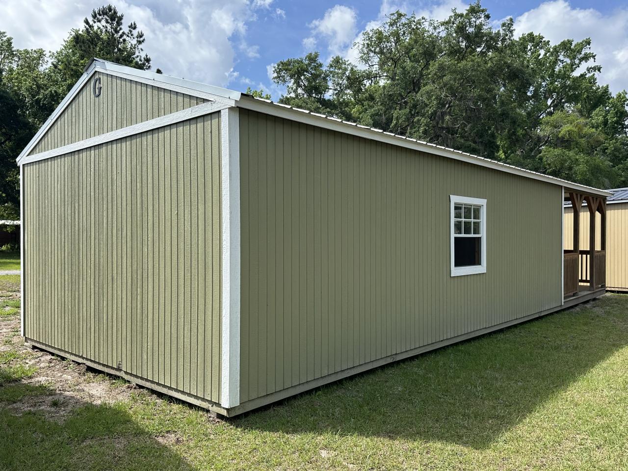 PRE-OWNED Graceland 16x40 Corner Porch Cabin
