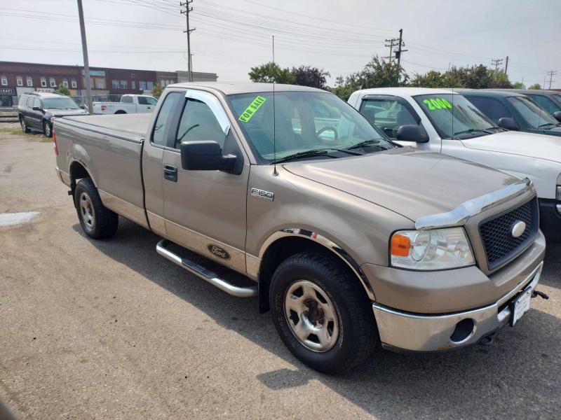 2006 Ford F150 Regular Cab 4x4 with an 8' Box