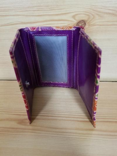 Genuine Leather Tirifold Wallet.
