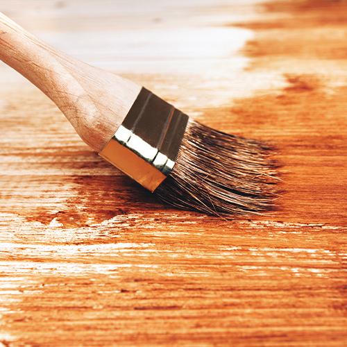 Staining Log Cabins, Decks & Fences