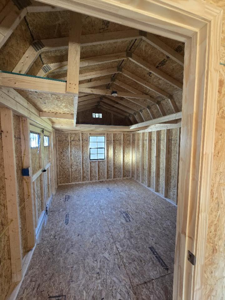 $1,013 off! -10x24 BARN W/DIVIDER WALL/100 AMP ELECT./WORKBENCH & MORE - $9,118 OR $360DOWN & $360/MO - FREE DELIVERY & BLOCKS