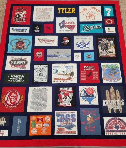 Mosaic T-shirt Quilt with Fabric in Between the T-shirt squares.