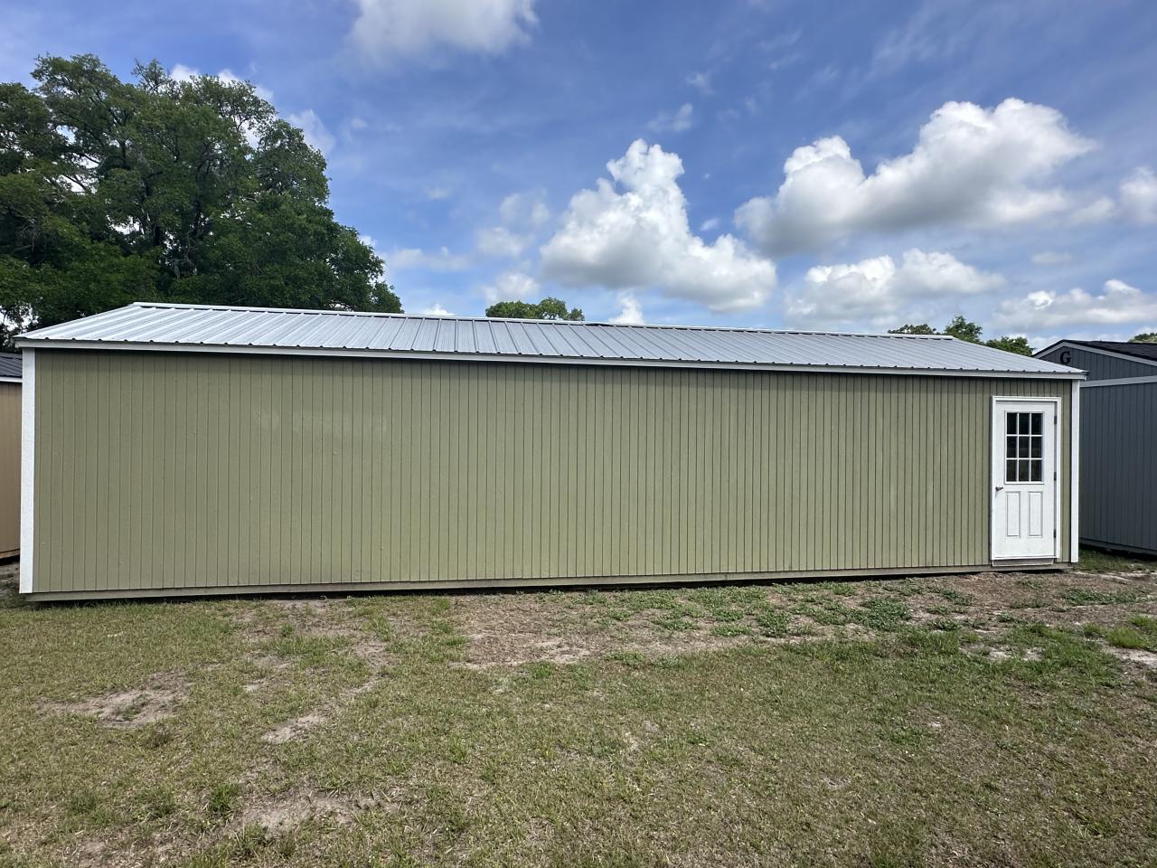 PRE-OWNED Graceland 16x40 Corner Porch Cabin