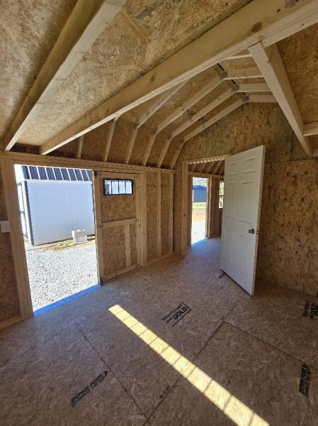 10% OFF - SAVE $1,043 on this 10x24 BARN W/DIVIDER WALL/100 AMP ELECT./WORKBENCH & MORE - $9,396 OR $371 DOWN & $371/MO - EVERYONE APPROVED - FREE DELIVERY & BLOCKS up to 50 Miles