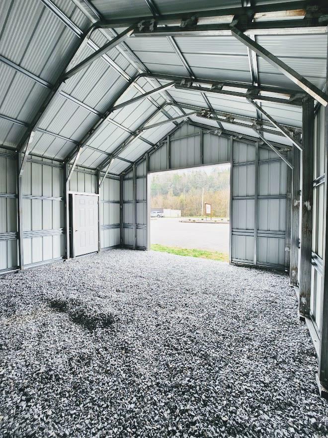 25% OFF! 20x20 PREMIER STEEL BUILDING - BOARD & BATTEN SIDING - 10X10 TRACK DOOR - DBL LEGS/RAFTERS