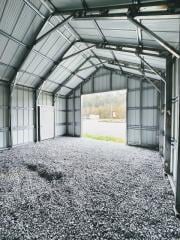25% OFF! 20x20 PREMIER STEEL BUILDING - BOARD & BATTEN SIDING - 10X10 TRACK DOOR - DBL LEGS/RAFTERS