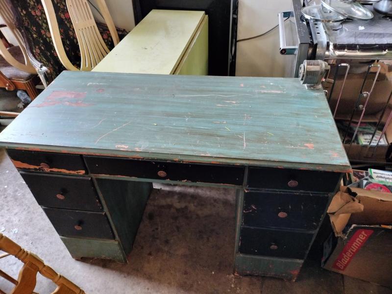 Antique green desk with pencil sharpener